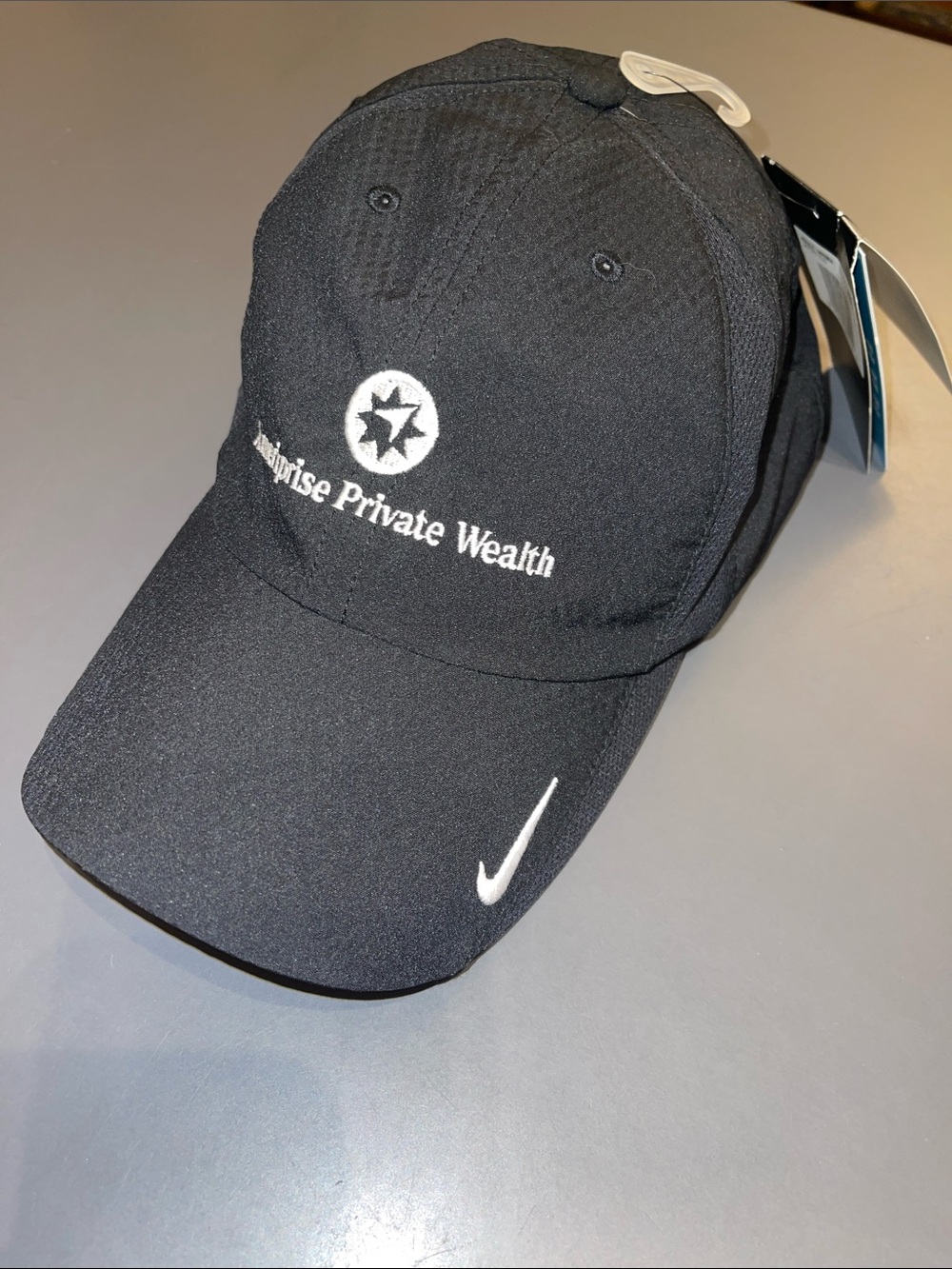 Unisex Nike black featherweight baseball cap with advertising embroidered